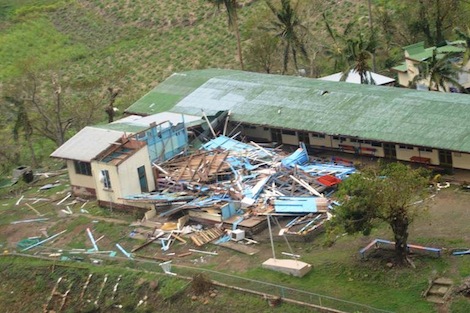 Image for article Worst of Cyclone Evan over with marina escaping unscathed